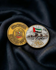 عملة ذهبية بنقش جنود الوطن – رمز الفخر الإماراتي